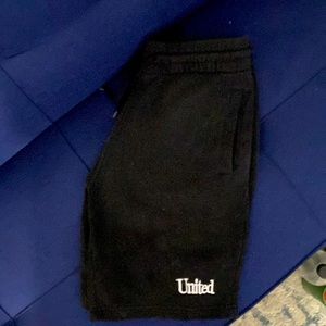 DIVIDES shorts with United 🌈 design